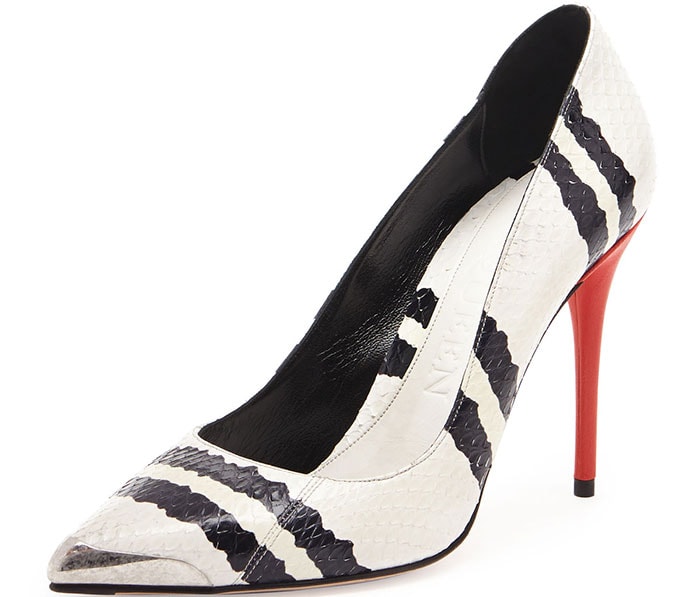 Alexander McQueen’s striped snakeskin pumps combine graphic black-and-white patterning with a sharp pointed toe and signature red stiletto heel for a statement finish that elevates even the simplest look