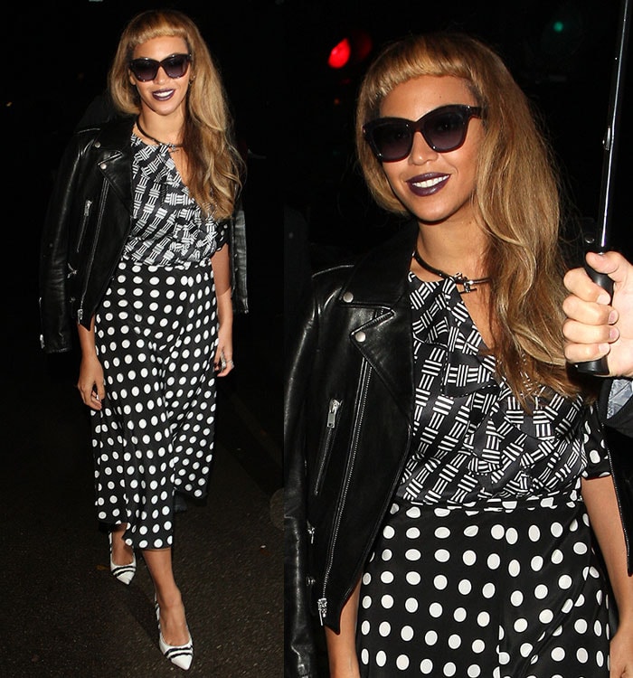 Beyoncé balanced graphic prints with edge by layering a black leather jacket over her patterned top, letting the outfit’s contrast set the stage for her statement heels