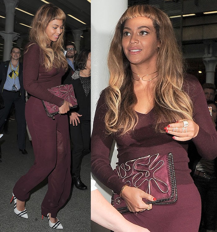 Beyoncé grounded her burgundy travel look with a Stella McCartney Falabella clutch and layered Ash + Ames gold chokers, letting sharp accessories elevate an otherwise streamlined silhouette