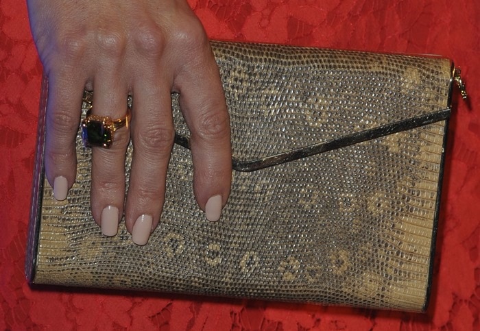Kate Hudson toting a snake-print Brian Atwood clutch
