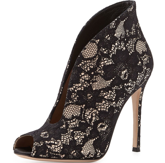 Gianvito Rossi black lace peep-toe booties featuring a signature V-cut vamp, sheer floral lace overlay, and a sleek stiletto heel that blends the elegance of a pump with the structure of an ankle boot