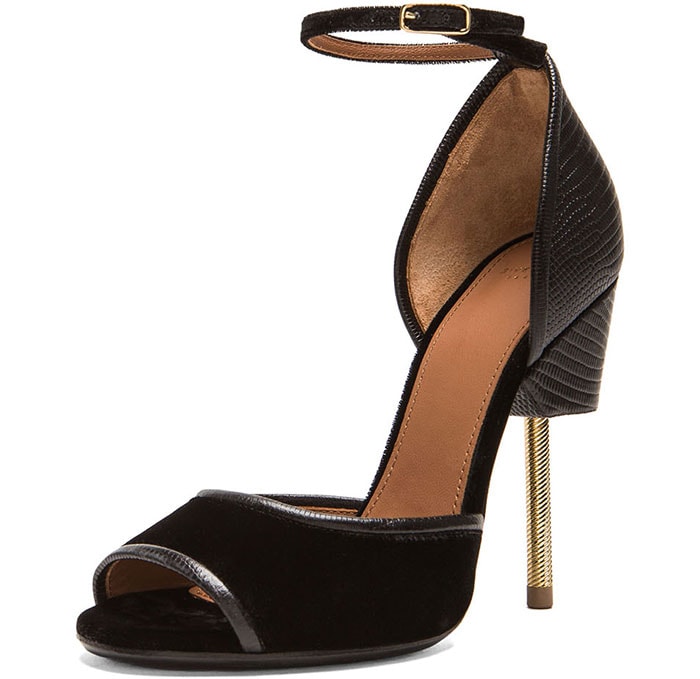 Givenchy's "Matilda" sandals in black feature a black velvet toe band, tegu lizard-effect leather trim, and a unique screw-debossed brass heel