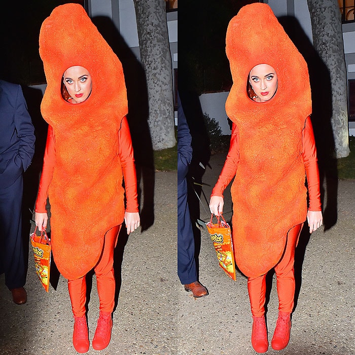 Katy Perry stuns in her creative and vibrant Flamin' Hot Cheetos costume at Kate Hudson's Halloween party