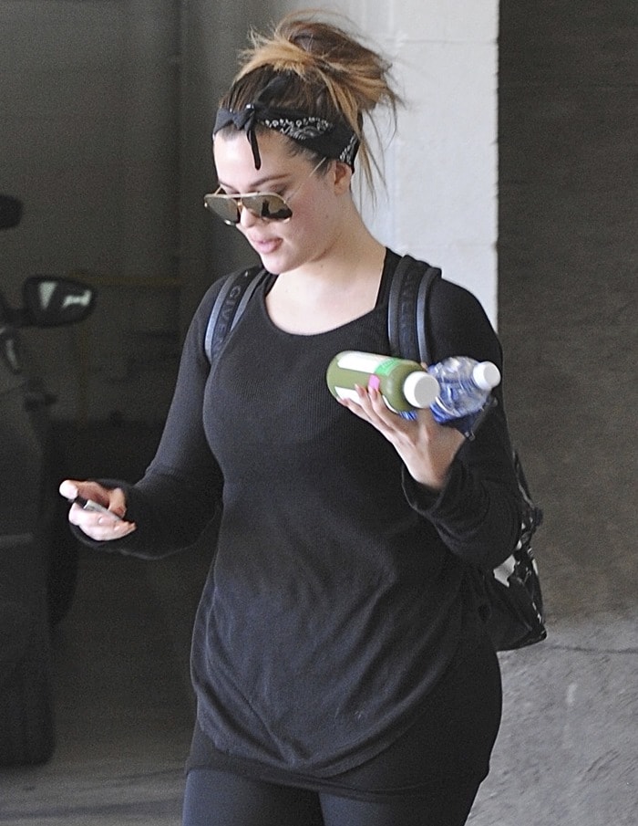 Khloé Kardashian wearing a thermal mullet shirt by Kings of Cole