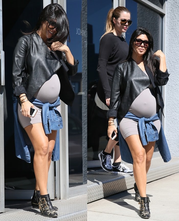 Kourtney Kardashian sported a mocha mini dress styled with a leather jacket