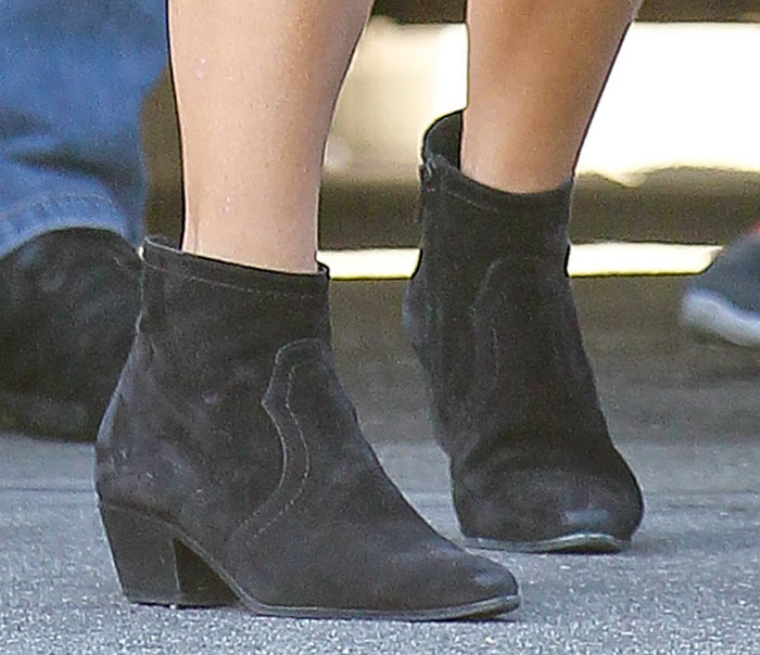 Kourtney Kardashian in ankle boots that gave off a city cowgirl vibe