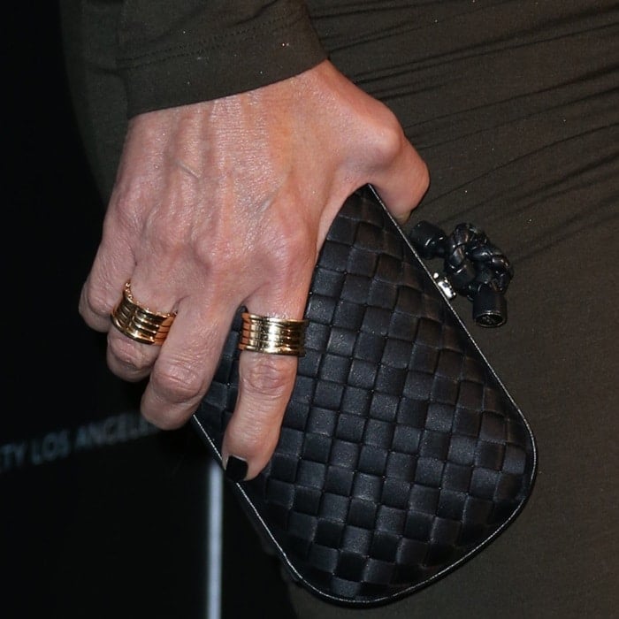Kris Jenner toting a Bottega Veneta clutch