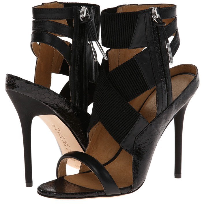 Gwen Stefani's leather sandals feature subtle snakeskin accents and elastic-gore straps