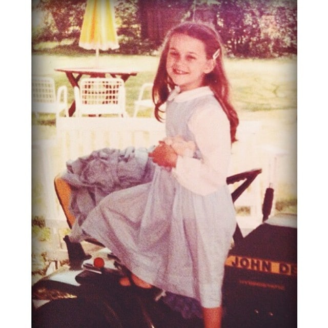 Photo shared by Reese on Instagram with the caption "Because what Southern girl doesn't love a John Deere tractor.. #TBT" - posted on October 2, 2014