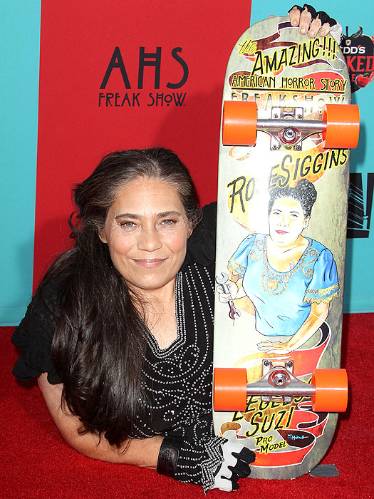 Rose Siggins brought her signature black embroidered top and gloves to the AHS: Freak Show premiere, posing proudly with a custom skateboard painted in her likeness as Legless Suzi