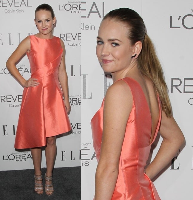 A vibrant look: Britt Robertson arrives at the 2014 ELLE Women in Hollywood Awards wearing a peach-toned Dior gown and a pair of chic Christian Louboutin "Mariniere" sandals