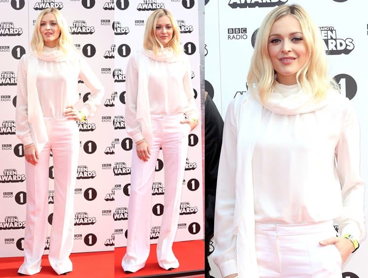 Fearne Cotton stepped onto the red carpet at the BBC Radio 1 Teen Awards in London on October 19, 2014, in a chic monochrome look featuring a flowing scarf, sheer blouse, and tailored wide-leg trousers