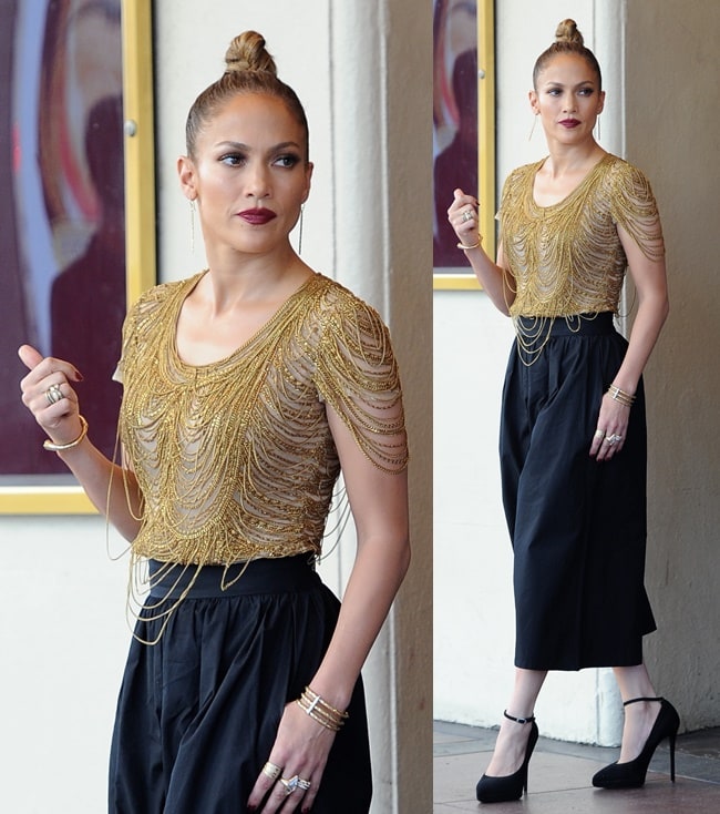 Jennifer Lopez channels Roaring Twenties glamour in a Naeem Khan gold-fringed top and cropped wide-leg pants