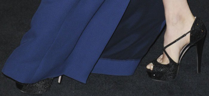 Amy Adams steps out in glamorous black peep-toe heels with crisscross straps, adding height and elegance to her look
