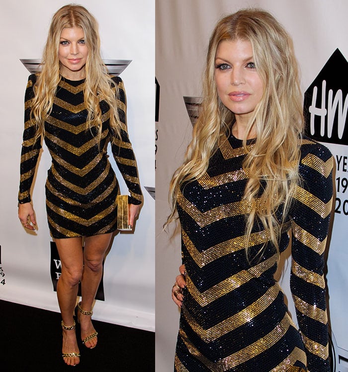 Fergie complements her Balmain mini dress with voluminous beach waves and soft makeup at the 2014 Emery Awards
