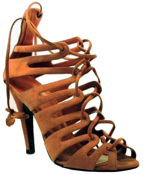 Hermès lace-up sandals featuring sculptural cutouts and wraparound ankle ties, the distinctive heels Kim Kardashian wore repeatedly throughout 2014, including the Hairfinity Hair Vitamins launch in London