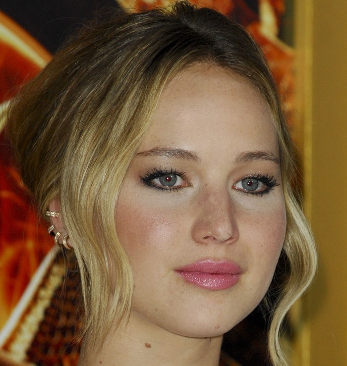 Jennifer Lawrence elevates her look with sleek, modern jewelry from Vita Fede and Anita Ko