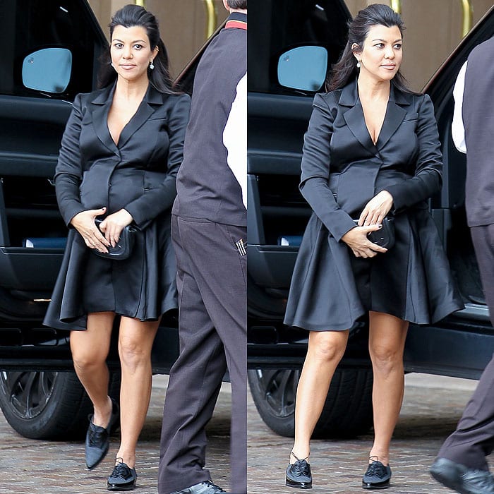 Kourtney Kardashian arrives at her baby shower in Beverly Hills wearing a tailored black blazer dress that flatters her growing bump with effortless sophistication