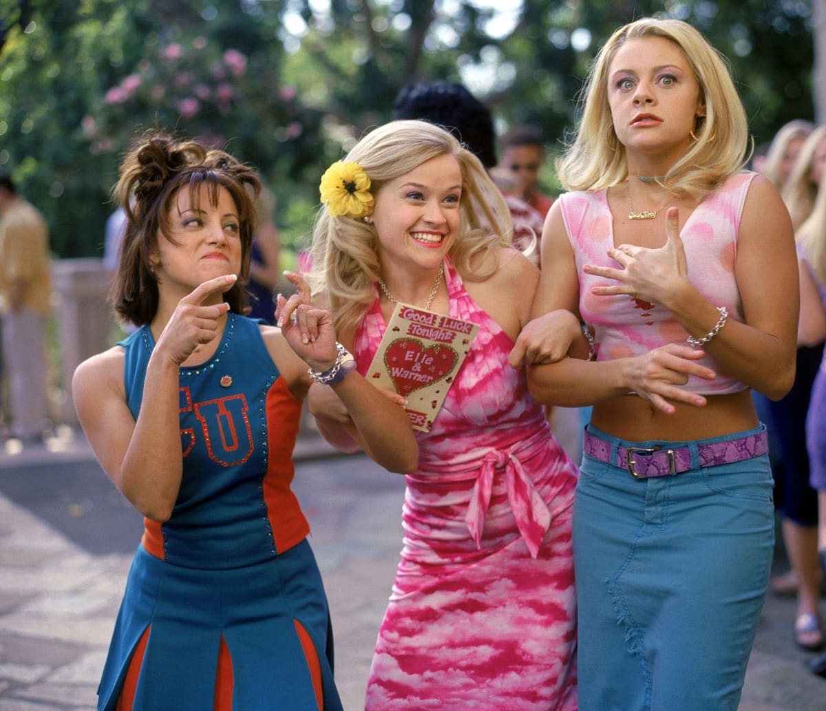 Reese Witherspoon as Elle Woods, Alanna Ubach as Serena McGuire, and Jessica Cauffiel as Margot in Legally Blonde