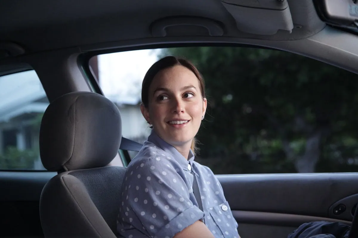 In "Life Partners," Leighton Meester portrays Sasha, a lesbian navigating her career and love life, replacing Kristen Bell and Evan Rachel Wood, who both had to drop out due to pregnancy
