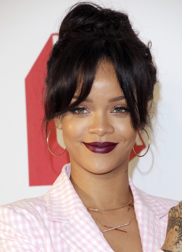 Rihanna accessorized with a variety of jewelry