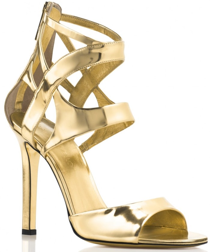 Tamara Mellon "Fatale Specchio" sandals in metallic gold feature mirrored leather, sculptural cutout straps, an open toe, a back-zip closure, and towering 105 mm stiletto heels that create a sleek, leg-lengthening silhouette with a polished, high-shine finish