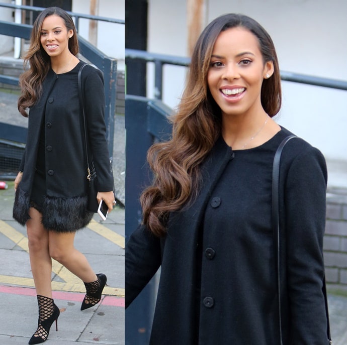 Rochelle Humes wearing Christian Louboutin Mrs Boulglione booties with a black lace-trimmed dress and fur-hemmed coat at ITV Studios in London on October 31, 2014
