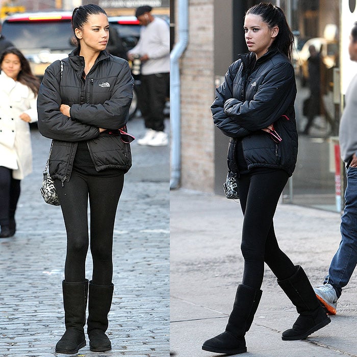 Adriana Lima bundles up in a sleek black down jacket paired with leggings and classic Ugg boots while stepping out in Manhattan’s Meatpacking District on December 4, 2012
