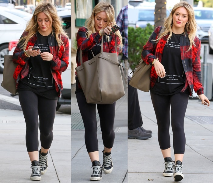 Hilary Duff rocks yoga tights paired with distressed hi-top sneakers