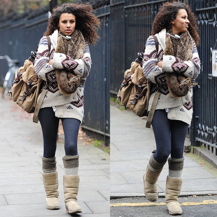 Holly Quin-Ankrah stays snug in a fur scarf, Fair Isle cardigan and thick knit socks paired with Ugg boots while arriving at Granada Studios in Manchester on December 15, 2010