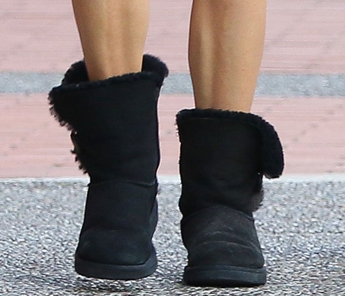 Nikki Reed wears black UGG Bailey Button boots
