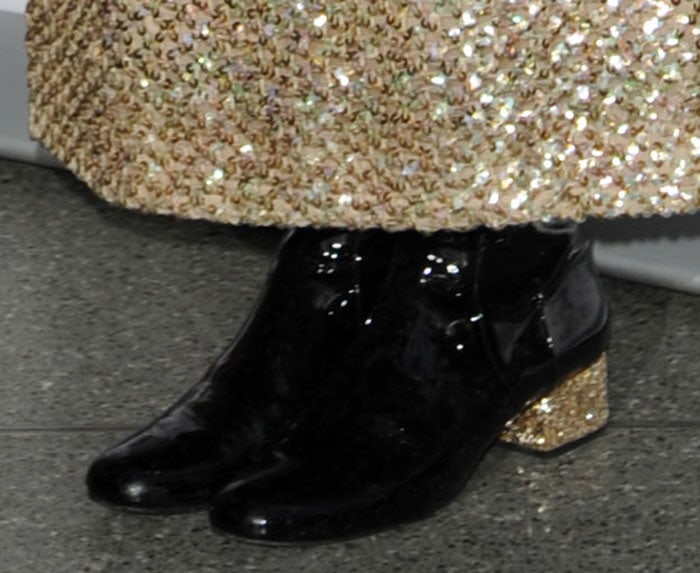 Pixie Lott in knee-high boots from Saint Laurent