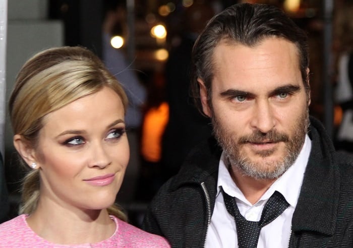 Reese Witherspoon and her Inherent Vice co-star Joaquin Phoenix share a warm red-carpet moment at the film’s Hollywood premiere