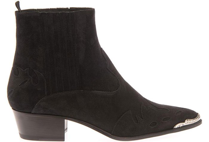 Side view of black suede Saint Laurent Duckies Western ankle boot with stitched detailing and metal toe cap