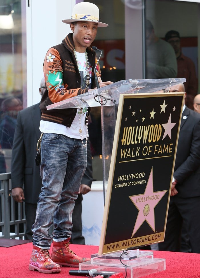 Pharrell Williams receiving a star on the Hollywood Walk of Fame in Los Angeles on December 4, 2014