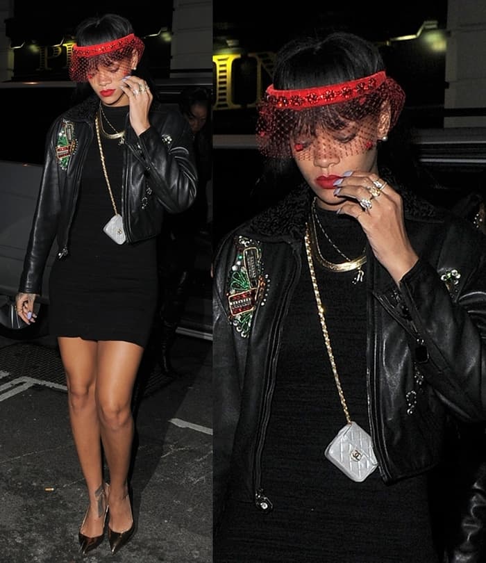 Rihanna turns heads outside Tramp club in London on March 26, 2014, rocking a mini Chanel purse, a bold embellished leather jacket, and a dramatic red mesh visor