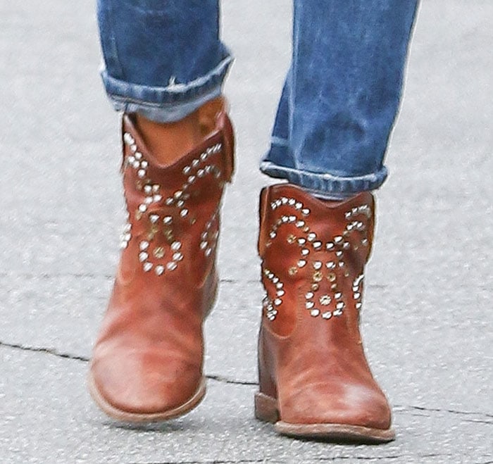 Alessandra Ambrosio steps out in Isabel Marant’s sold-out “Caleen” boots, featuring Western-inspired stud detailing that adds edge to any casual outfit