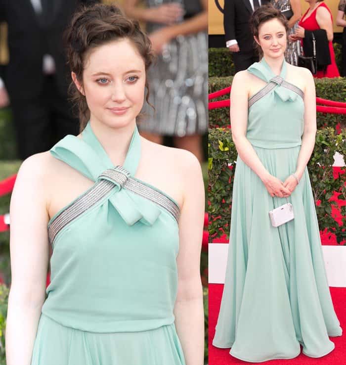 Andrea Riseborough in a sea green version of an Escada Pre-Fall 2015 design, with her footwear mostly hidden by the flowing gown