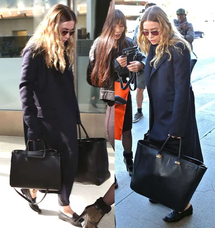 Ashley Olsen keeps it effortlessly chic at LAX in black loafers, cropped pants, and a long navy coat, finishing the look with a structured oversized tote