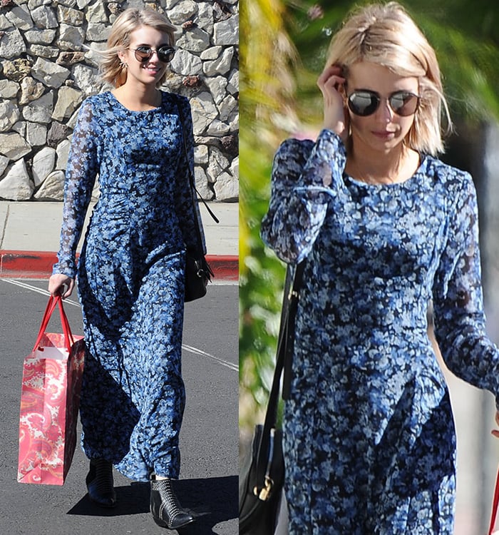 Emma Roberts styling a blue floral maxi dress with black studded Anine Bing boots and a Gucci crossbody bag