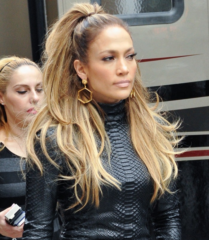 Jennifer Lopez's long-sleeve fitted snakeskin dress