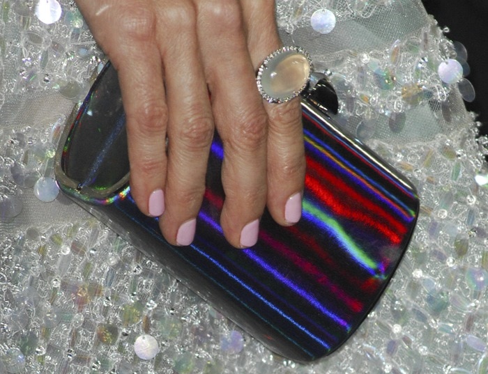 Leslie Mann complemented her pastel manicure with a moonstone statement ring and a holographic Jimmy Choo clutch