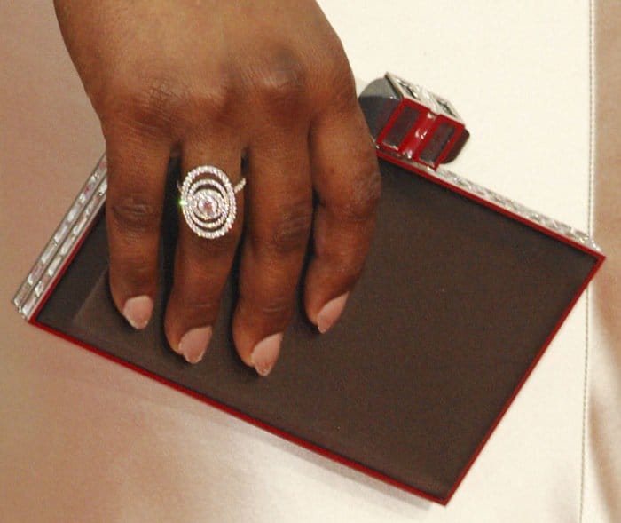 Laverne Cox accessorized the ensemble with a Judith Leiber clutch