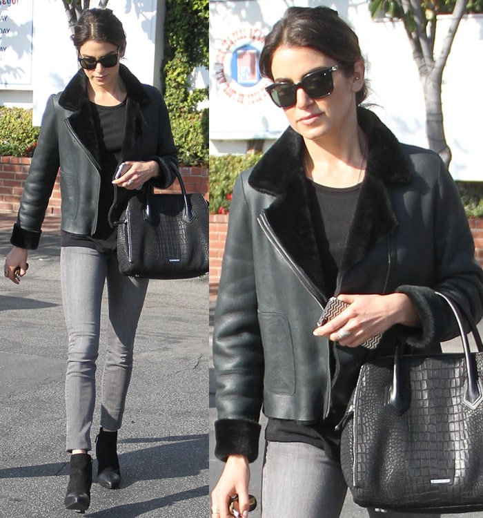 Nikki Reed keeps it chic in a Tory Burch reversible leather-and-shearling jacket, paired with gray skinnies, croc-embossed Rebecca Minkoff bag, and sleek ankle boots