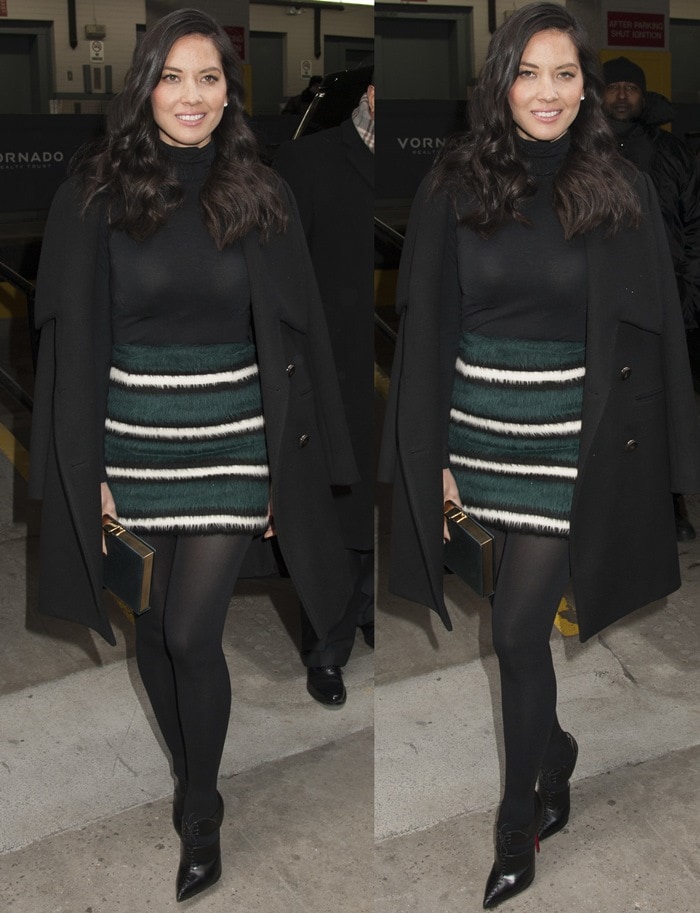 Olivia Munn steps out in a chic winter look—pairing her Wolford Colorado String Body turtleneck with a striped green-and-white skirt, black tights, and Christian Louboutin “Corsita” ankle boots