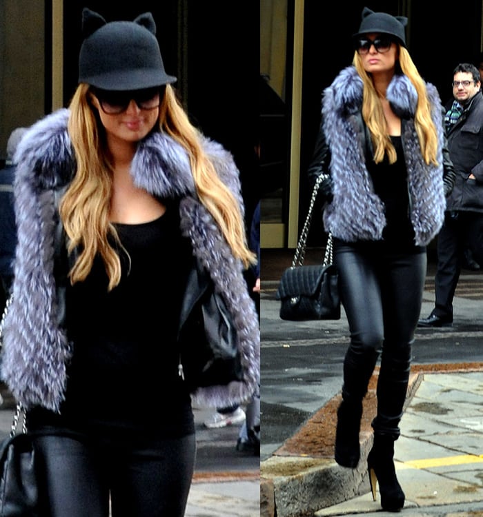 Paris Hilton wears Rag Bone leather pants with a quirky Helene Berman cat ears cap in Milan