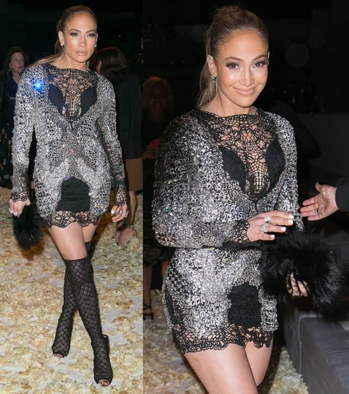 Jennifer Lopez turns the Tom Ford Autumn/Winter 2015 presentation into her own runway, pairing a crystal-embellished mini dress with fishnet lace-up thigh-high boots and a black fur clutch