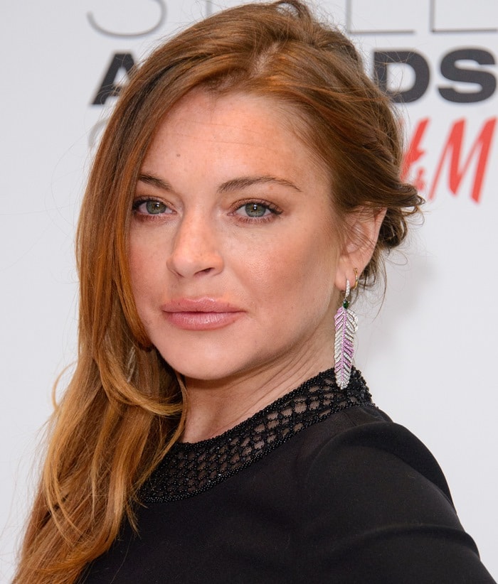 Lindsay Lohan shows off her Crow’s Nest earrings