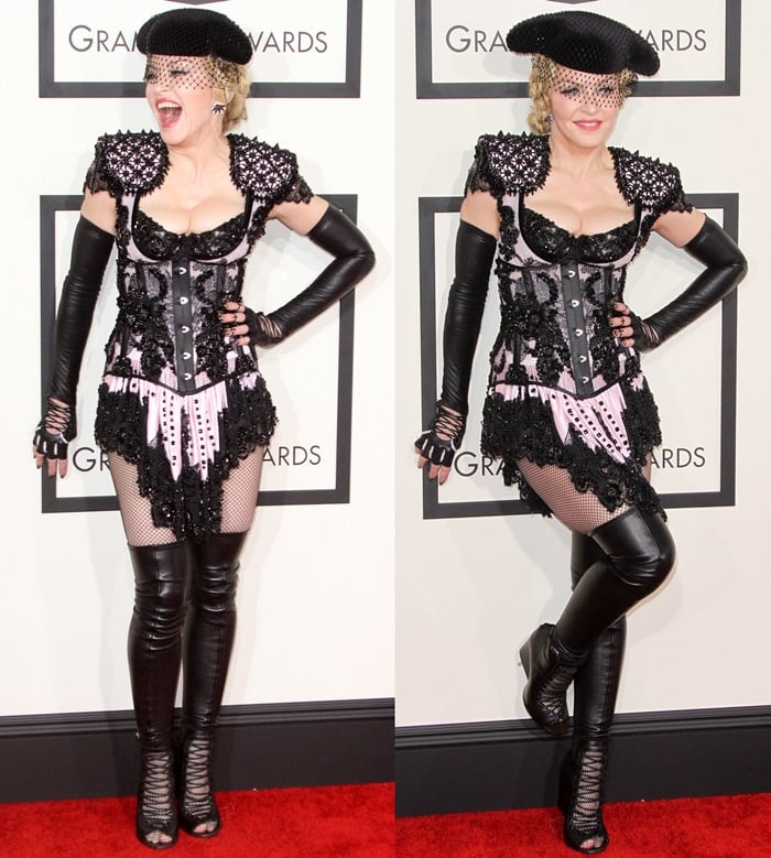 Madonna turned heads in a daring Givenchy ensemble featuring a black corset, lace accents, thigh-high boots, and a veiled beret, giving the red carpet a theatrical touch of cabaret-meets-matador flair