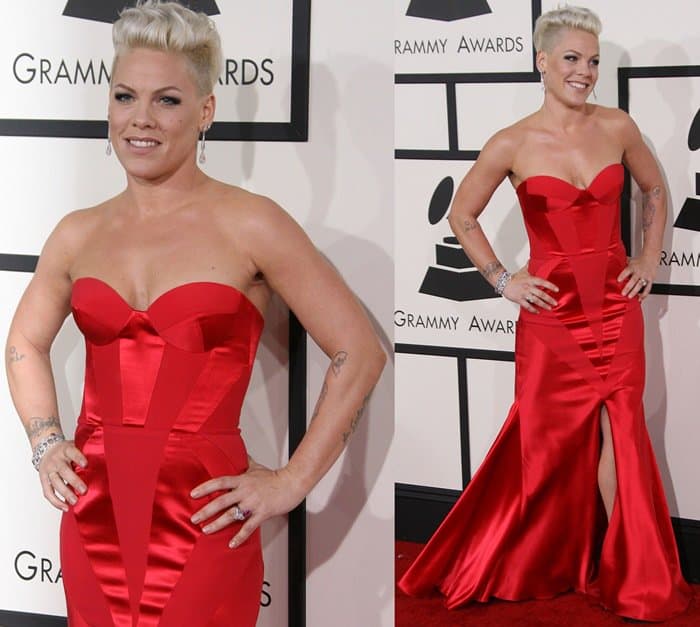 Pink wore a crimson strapless dress by Johanna Johnson that featured structured panels and a front slit
